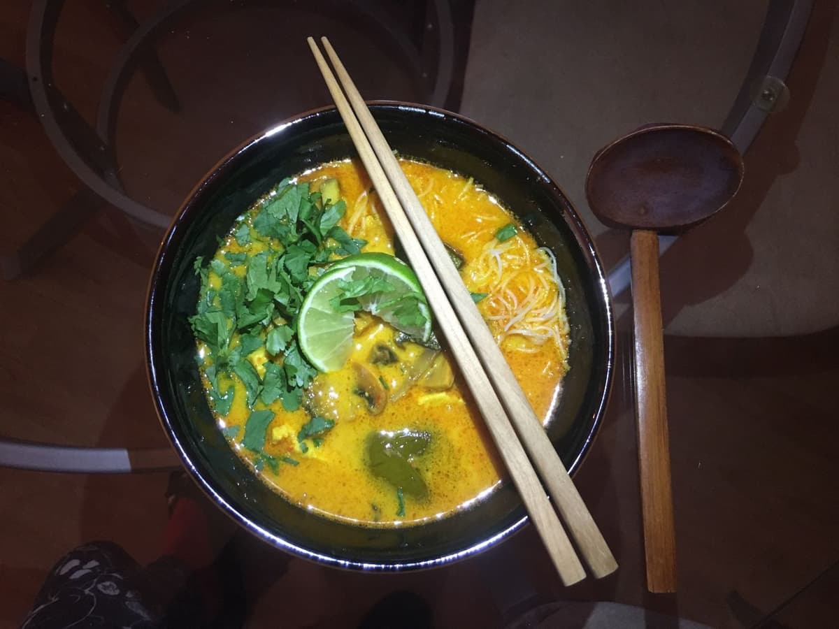 Laksa served with a noodle trio